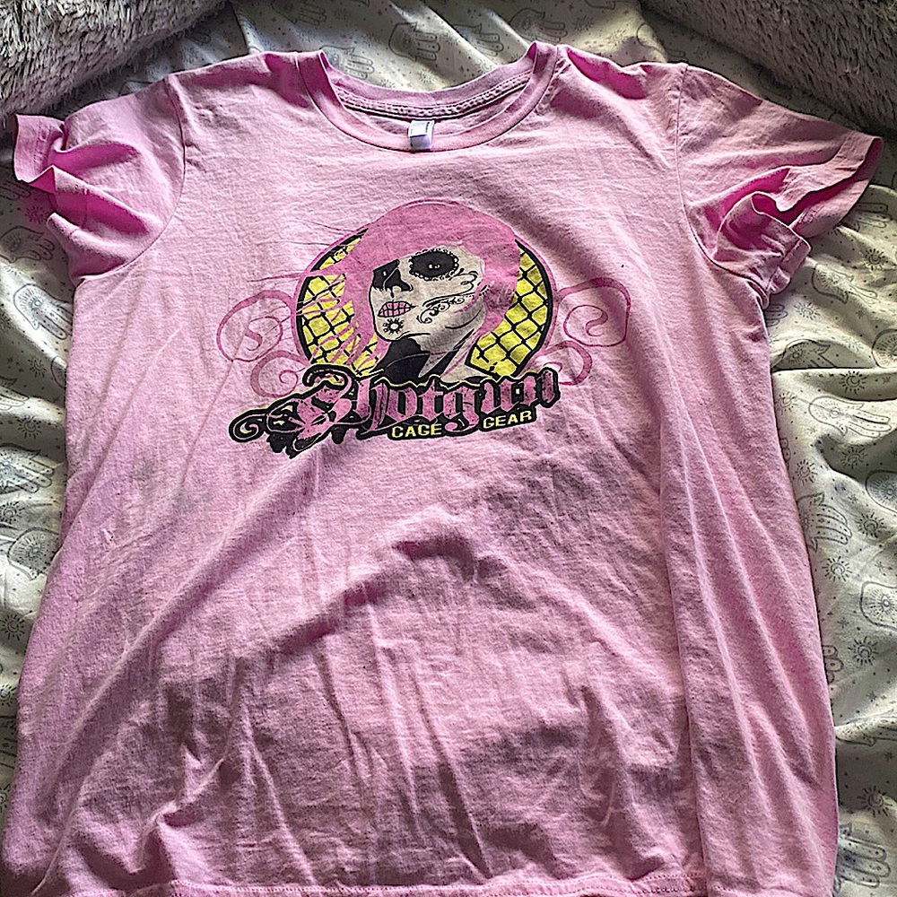 Pink L shotgun cage gear shirt.
